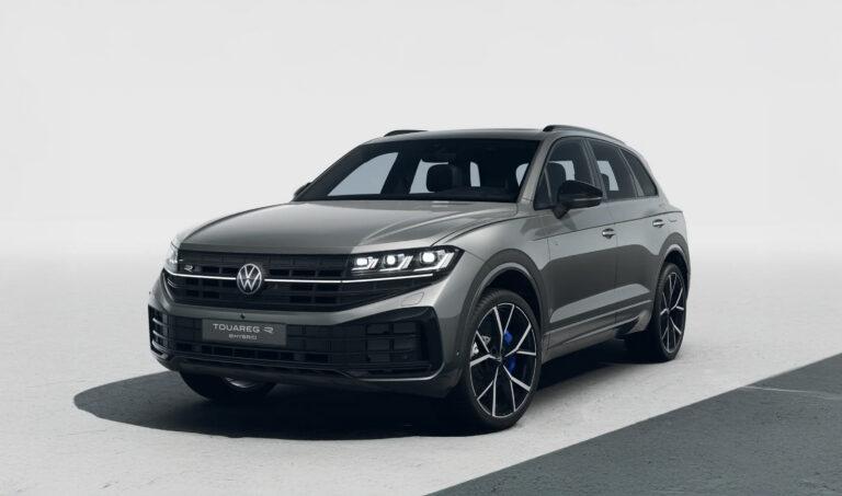 Touareg R-Line - Gewerbeleasing 4 Volkswagen Touareg R V6 in dunkelgrauer Lackierung, Frontansicht mit LED-Scheinwerfern und schwarzen Felgen mit blauen Akzenten.